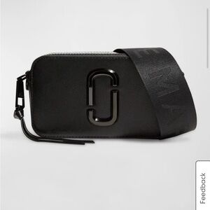 Marc Jacob’s camera bag with crossbody strap